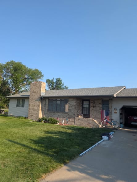 Brick ranch home with completed new architectural shingle roof