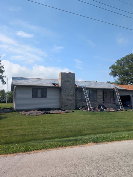 Brick ranch mid-project — tear-off and underlayment installed