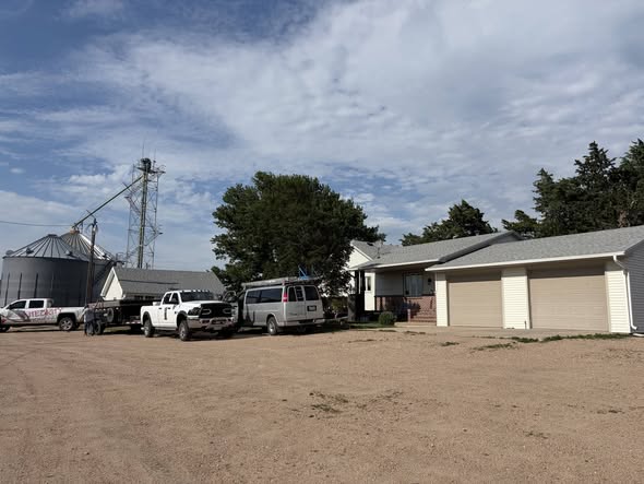 Farmstead outbuildings and garage with new roofing, Kearney County NE